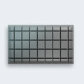 Graphite-infused memory foam pillow core with a grid-cut design for cooling airflow and pressure relief.
