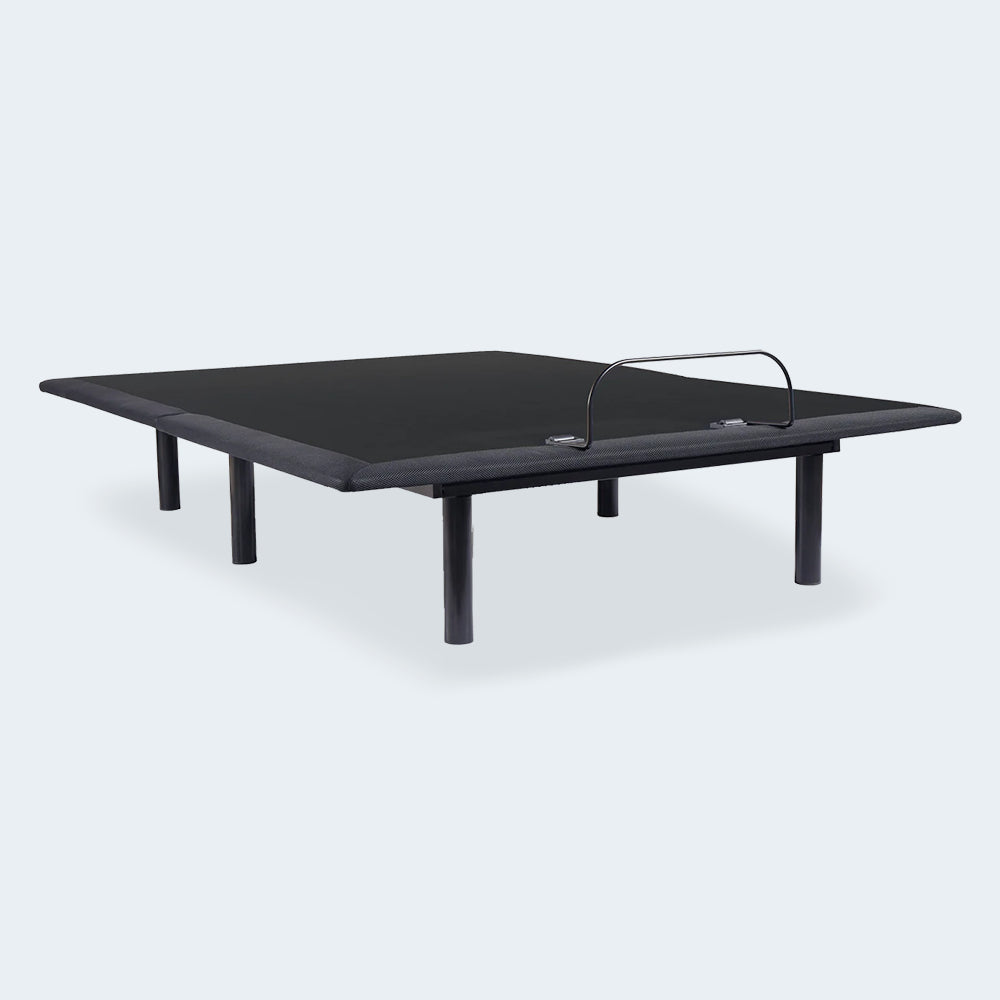 Ashley Head Up Only adjustable bed base shown in a flat position with charcoal grey upholstery and heavy-duty steel legs.
