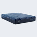Angled view of the Serta iSeries NXG 1500 Hybrid Firm mattress featuring a cooling geometric cover.

