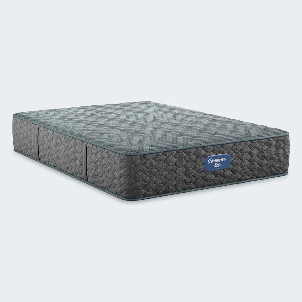 Simmons Beautyrest Core 13 Inch Firm Mattress with a grey quilted cover for back and stomach sleepers.
