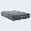 Simmons Beautyrest Core 13 Inch Firm Mattress with a grey quilted cover for back and stomach sleepers.
