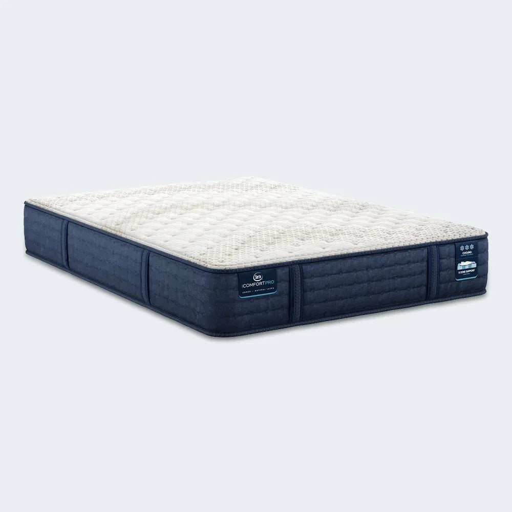 Serta iComfortPRO Chelsea 12" medium mattress with a quilted cooling cover and supportive navy side panels.
