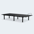 Malouf Weekender 50 Series motorized bed frame in a neutral flat position showing the low-profile deck and steel legs.
