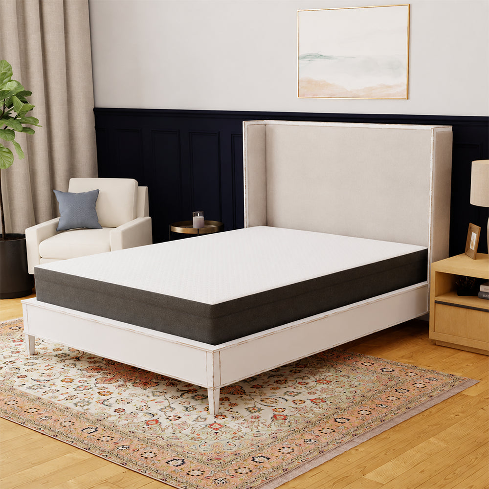 High-angle shot of the Rose 10-inch mattress by South Bay showcasing the quilted white sleep surface and dark grey side fabric.
