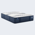Perspective view of Serta iComfortPro Kingston 14" firm latex mattress with cooling cover and navy blue border.
