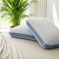 Stacked BEDGEAR Flow Performance Pillows in 1.0 and 2.0 lofts featuring breathable Air-X mesh technology.

