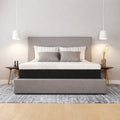 Front view of the Restore Copper 10" Foam Mattress for medium comfort support in a bright modern bedroom setting.