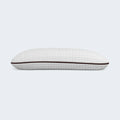 Side profile of a supportive copper memory foam pillow with a quilted grid cooling cover.
