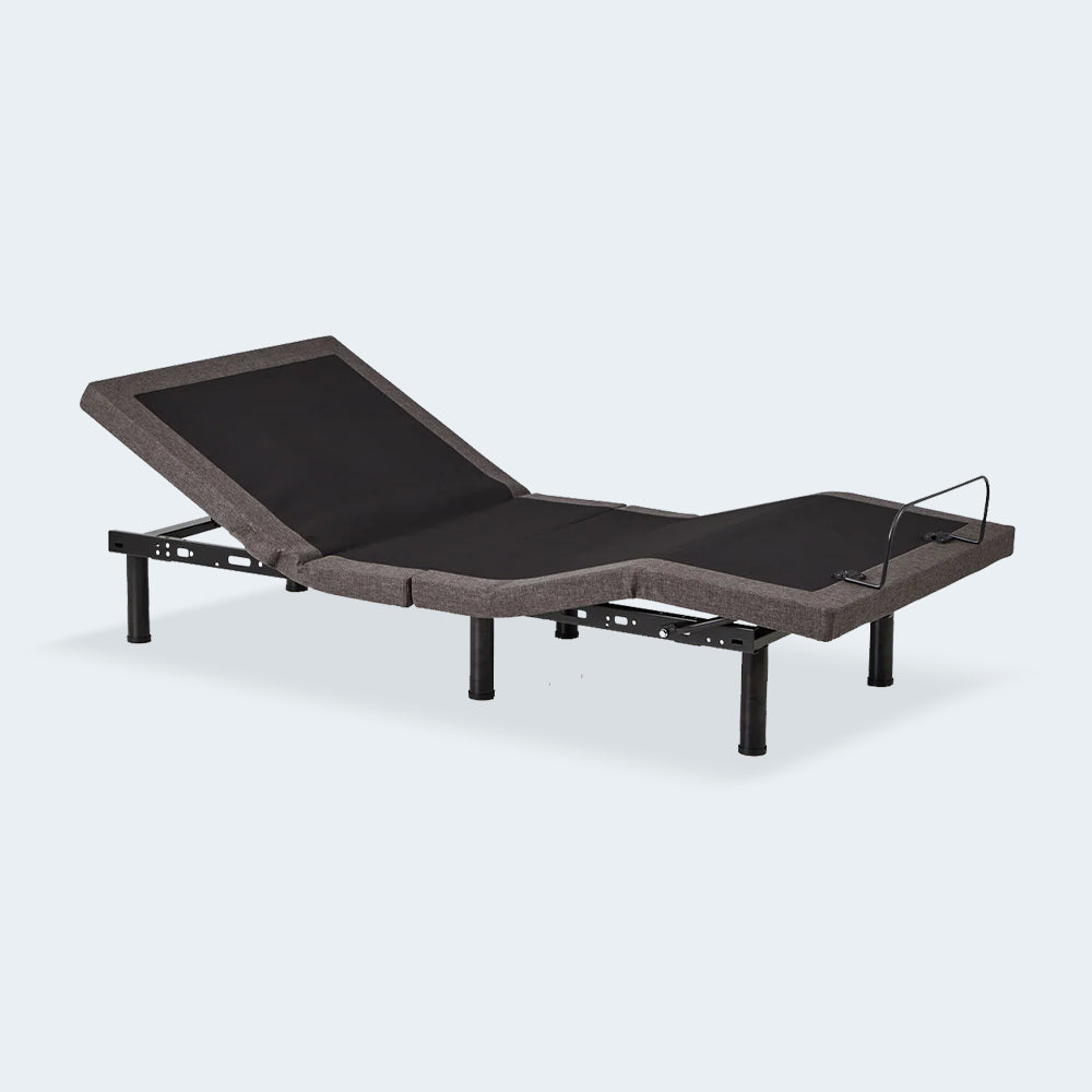 Perspective view of the Malouf M455 motorized bed frame on a clean background showing independent head elevation.
