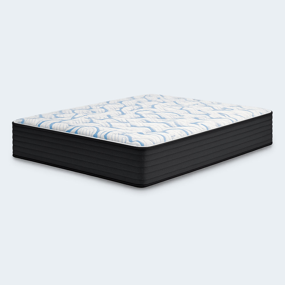 Three-quarter view of the high-profile 14-inch Elite Springs firm mattress by Ashley, engineered for back and stomach sleeper support.
