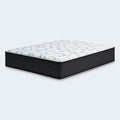 Three-quarter view of the high-profile 14-inch Elite Springs firm mattress by Ashley, engineered for back and stomach sleeper support.

