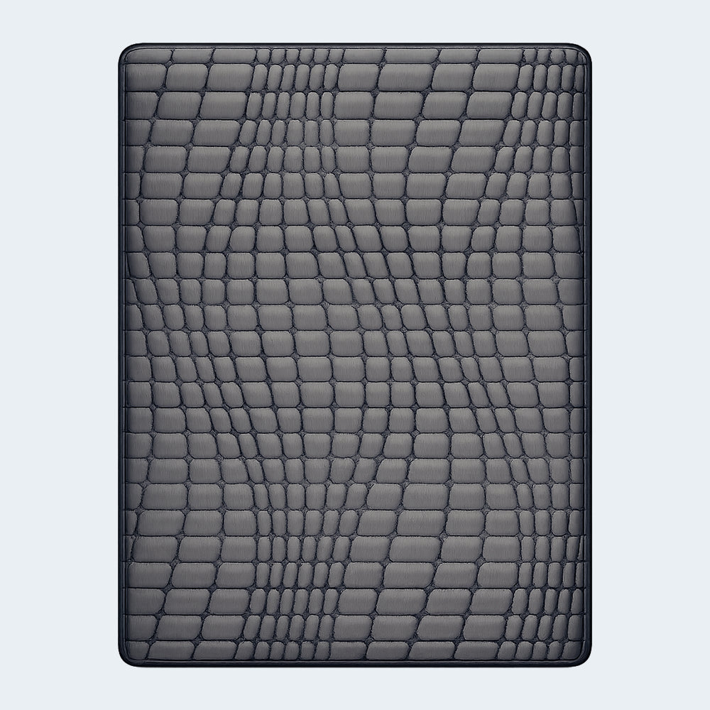 Overhead view of the Gray 1200 Hybrid 12-inch firm mattress showing the unique textured grid quilting pattern for pressure relief.
