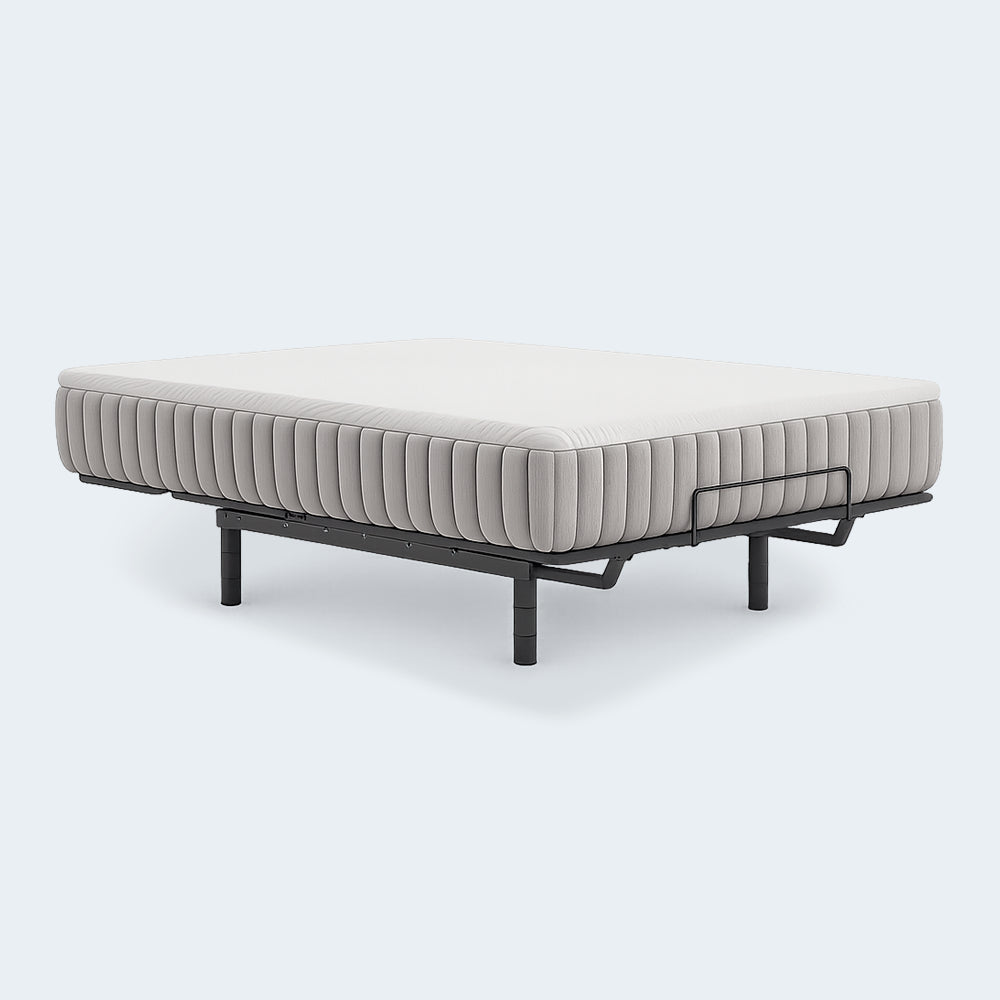 Profile detail of the Ashley Furniture Terra Sleep mattress flexing on a motorized adjustable base for personalized comfort and pressure relief.
