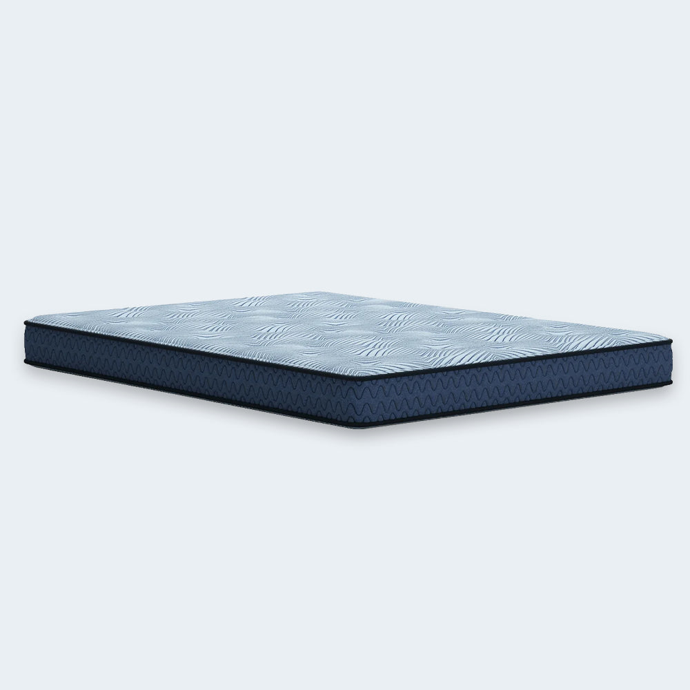 Direct side view of the Peak 2.0 8-inch Bonnell mattress by Ashley Sleep, ideal for guest rooms, bunk beds, and trundle beds.
