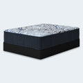 Luxe 2.0 Blue 15-inch Mattress by Ashley shown on an adjustable power base for customized comfort and pressure point relief.
