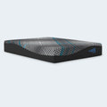 Ashley Millennium 2.0 Hybrid Mattress with the head raised on an adjustable power base in a designer bedroom interior.