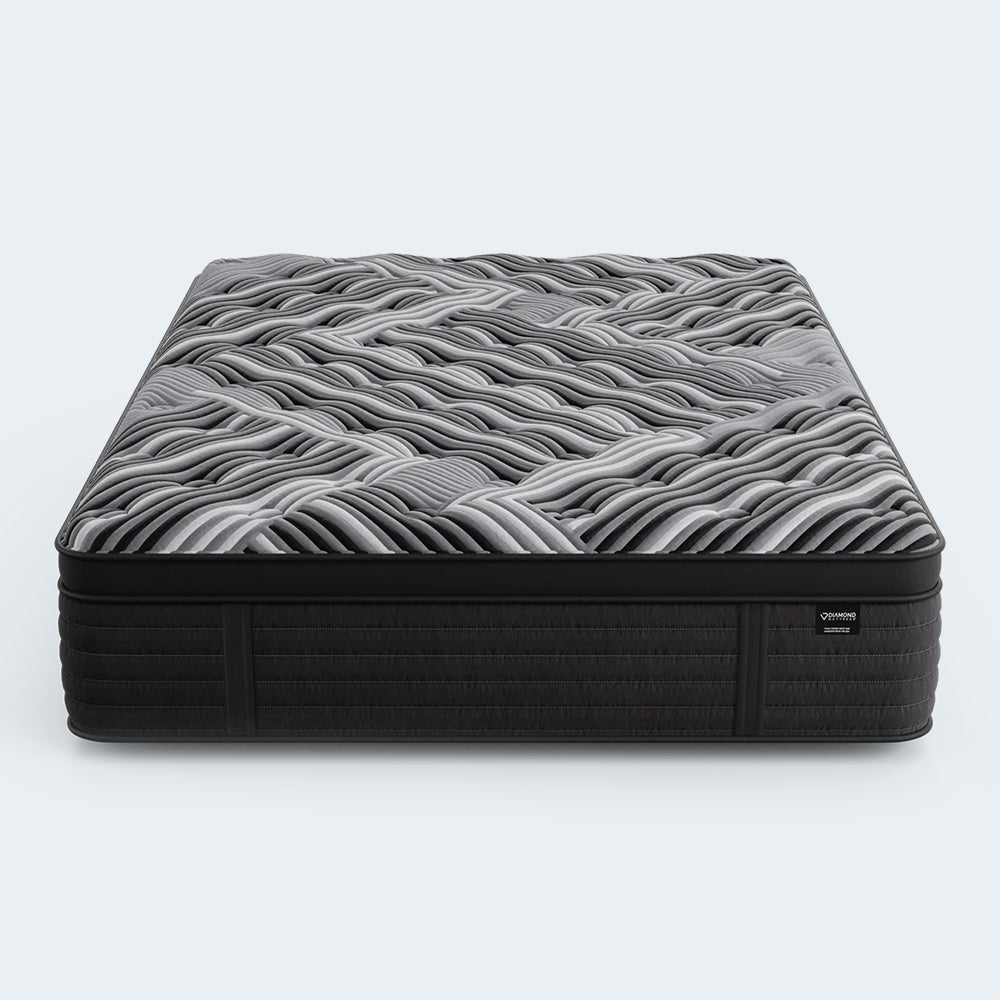 Frontal shot of the Dreamstage 2.0 Calm Quilted 15-inch Mattress by Diamond Mattress showing the bold geometric quilted design for maximum pressure relief.
