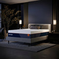 Modern luxury bedroom interior featuring the Nectar Ultra Hybrid Medium-Firm Mattress styled on a grey upholstered bed frame with designer decor.
