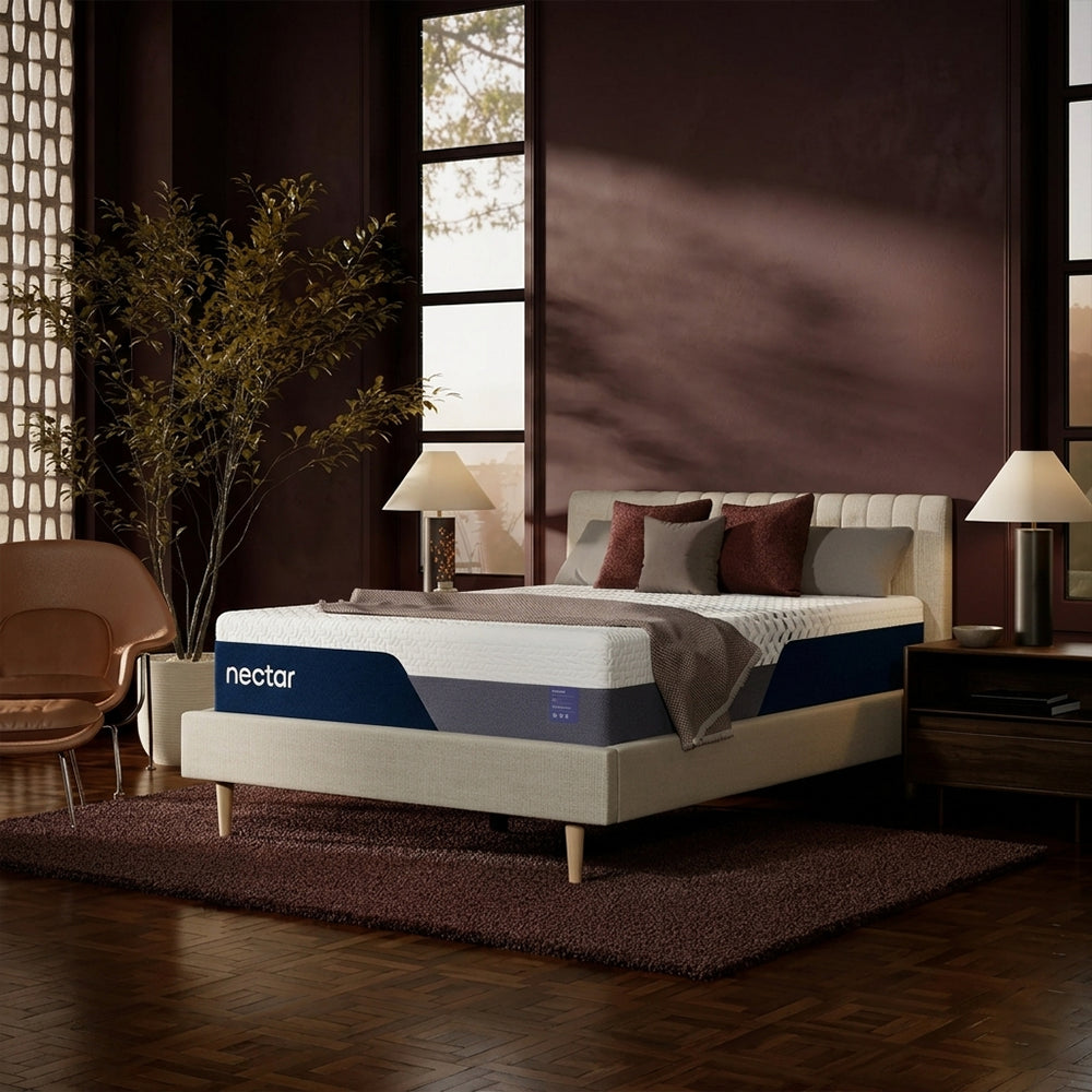 Contemporary bedroom interior featuring the Nectar Luxe 14-inch mattress, optimized for cooling comfort and pressure-relieving support.
