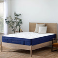 Three-quarter angle view of the Weekender 13-inch medium plush mattress styled in a contemporary bedroom with natural wood furniture.
