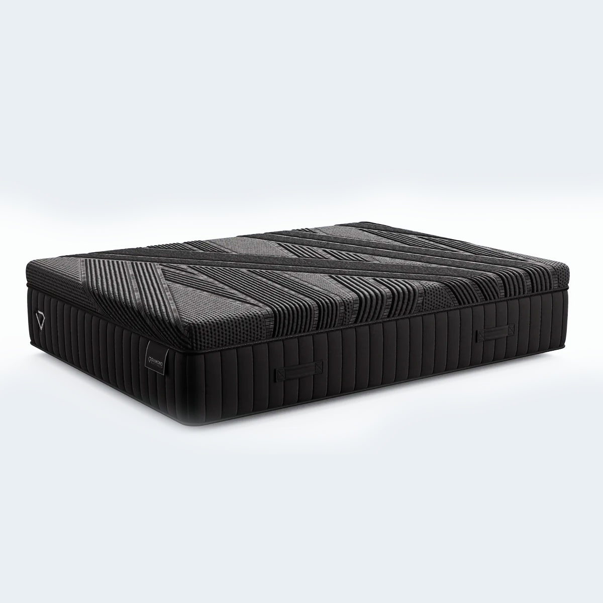 Angled studio shot of the Black Diamond 15" All-Foam Mattress showcasing the modern quilted top and black sides.