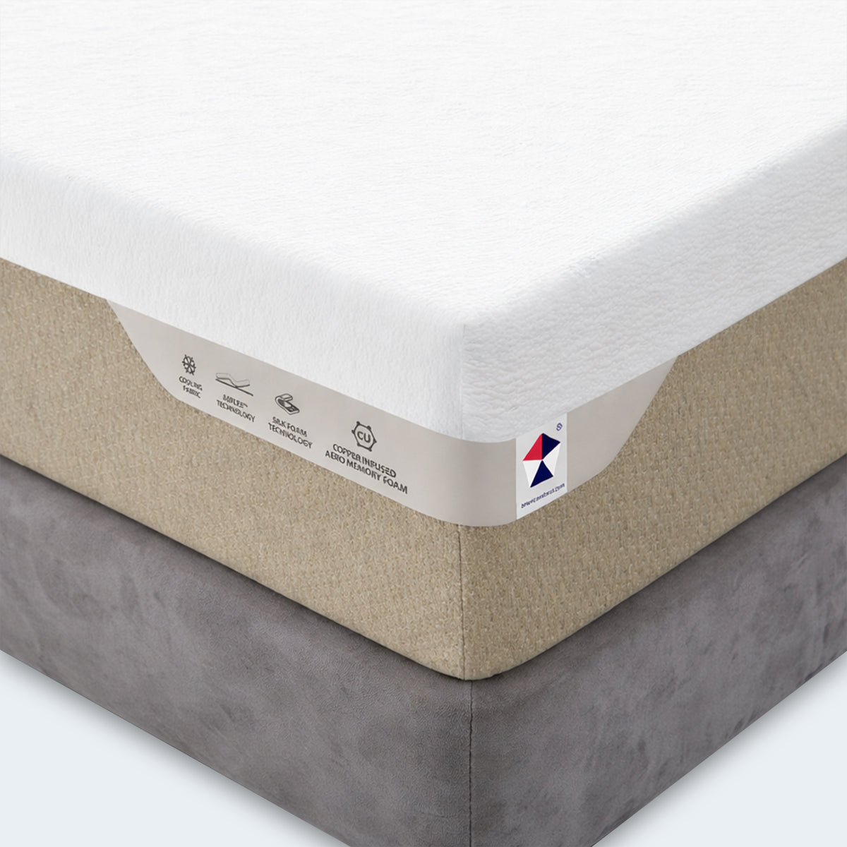 Close-up corner of a plush memory foam mattress highlighting copper infused memory foam and silk foam technology.