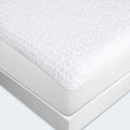 Folded BEDGEAR Dri-Tec Kids Mattress Protector highlighting the soft, multi-layered breathable fabric for extra comfort.