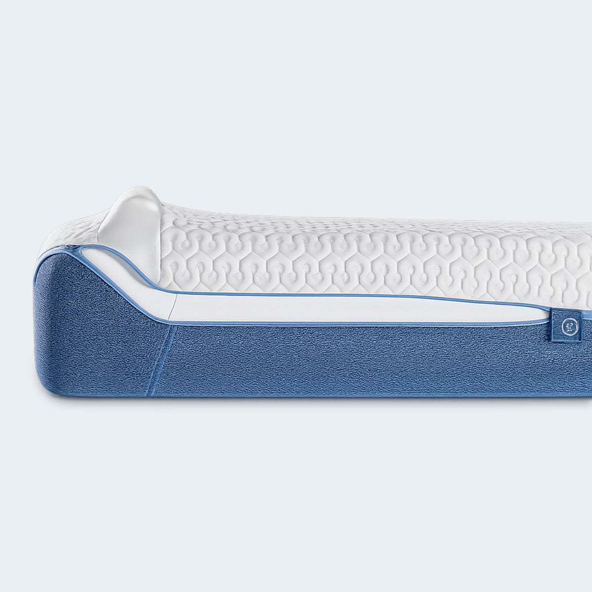 Close-up of the X1 Kids Performance Mattress edge featuring the hexagonal airflow fabric and premium blue stitching.
