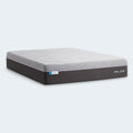 Side angle of the Polaris 12" Activair Hybrid Mattress featuring a grey cooling cover and charcoal base.