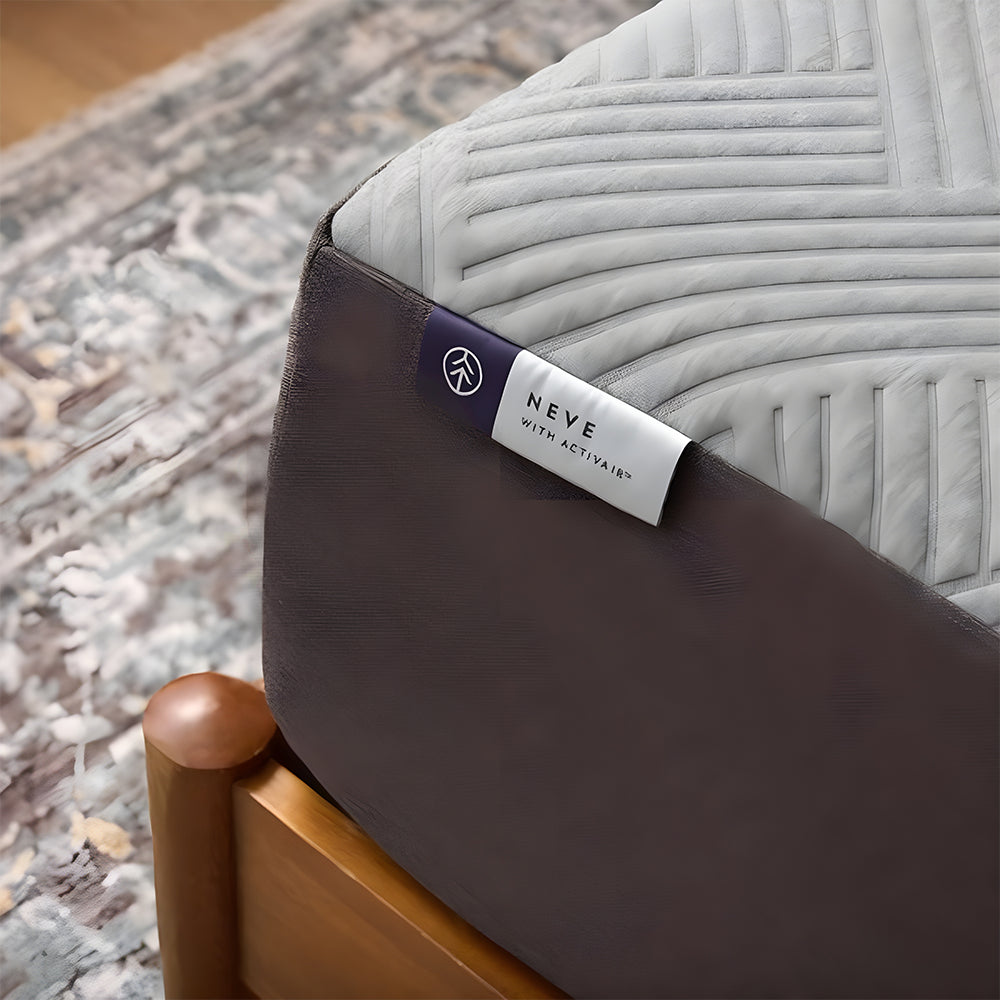 Detailed close-up of the Neve with ActivAir product tag on the corner of a Malouf 12-inch luxury all-foam mattress.
