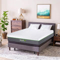 Modern master bedroom featuring the GhostBed Elite 12-inch mattress on a grey upholstered platform bed frame with neutral decor.
