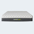 Front-facing profile of the isolated GhostBed 14-inch memory foam mattress with a grey side border and white diamond-patterned quilted top.
