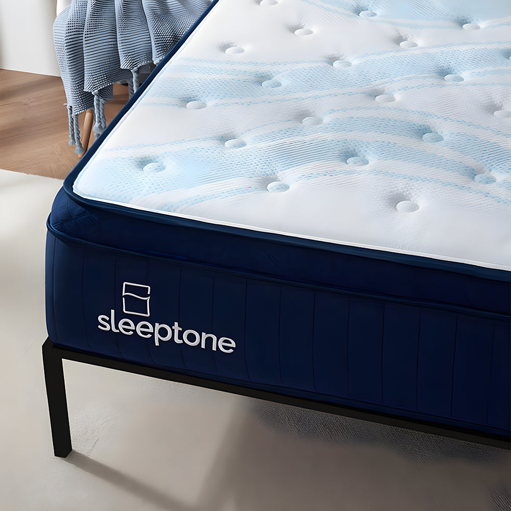 Close-up of the Sleeptone logo and textured blue side panels of the 14-inch hybrid mattress, showcasing high-quality stitching and breathable fabric.
