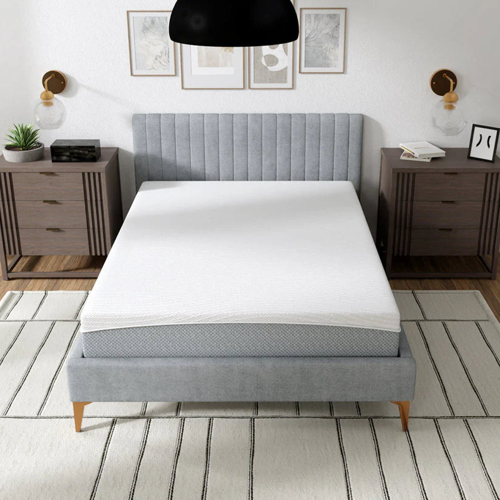  Top-down view of the EcoCore Hybrid plant-based foam mattress by South Bay on a designer platform bed frame.