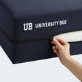 Close-up of the heavy-duty zipper on a University Bed waterproof mattress protector for easy dorm bed setup.

