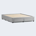 Upholstered storage bed frame in Stone grey featuring a low-profile Watson design by Malouf for modern bedrooms.
