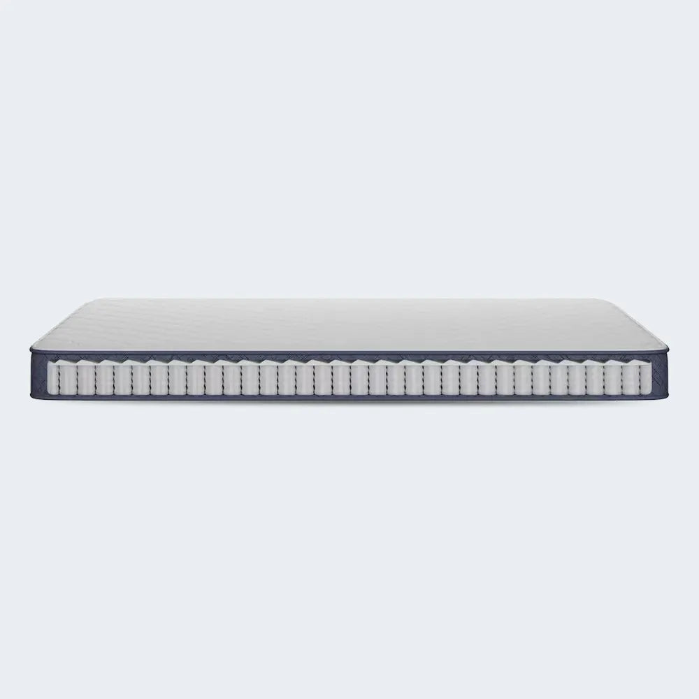 Interior pocketed coil support system of the Serta Perfect Day 7 inch firm mattress in a box.
