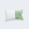 Split view of Ghetti Reactive pillow showing colorful adjustable shredded memory foam filling for personalized sleep.
