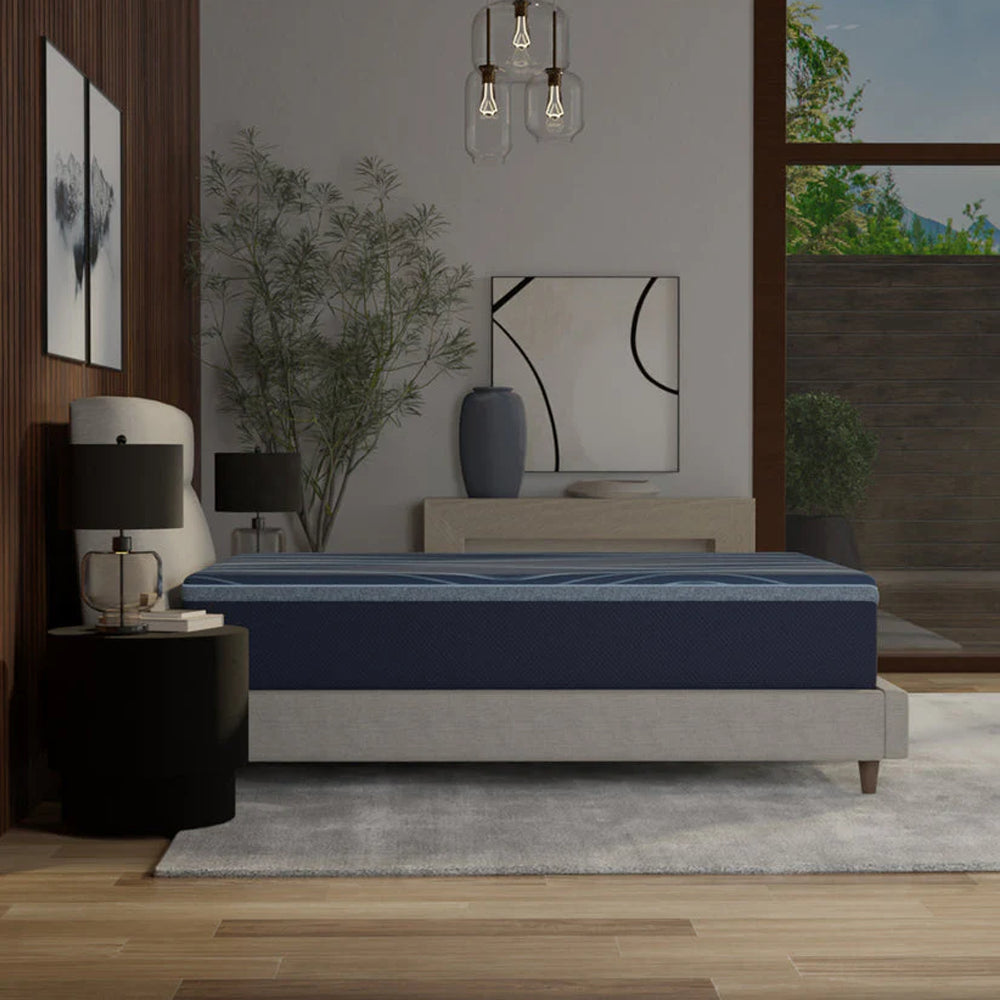 Side profile of the 14-inch thick ActiveAlign hybrid mattress by South Bay in a contemporary master bedroom with wood-paneled walls.
