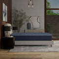 Side profile of the 14-inch thick ActiveAlign hybrid mattress by South Bay in a contemporary master bedroom with wood-paneled walls.

