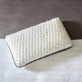 High-angle view of the Malouf Quilted Convolution pillow featuring a soft, textured cooling surface.
