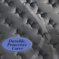 Close-up of the durable, hypoallergenic protective cover on the Nightsbridge Orion plush mattress.
