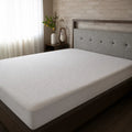 Folded BEDGEAR Dri-Tec mattress protector with breathable, moisture-wicking fabric for better airflow.
