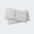 Set of two folded light gray BEDGEAR Hyper-Linen pillowcases, ideal for hot sleepers seeking temperature control.
