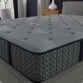 Close-up detail of the tufted quilted top and durable side stitching of the Allureluxe™ 10-inch hybrid mattress by South Bay.
