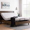 Structures N150 adjustable bed foundation with the head section raised for reading or watching TV in a contemporary bedroom.
