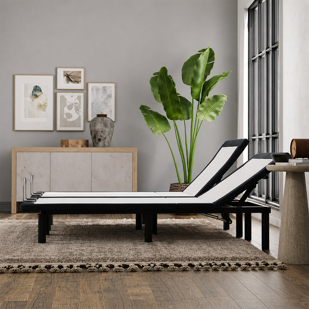 Side-by-side SBKDH Head up Adjustable Bases in a split setup, illustrating the motorized head elevation feature in a contemporary bedroom environment.
