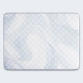 Top view of the textured, diamond-quilted white surface on a Serta Perfect Day firm mattress.
