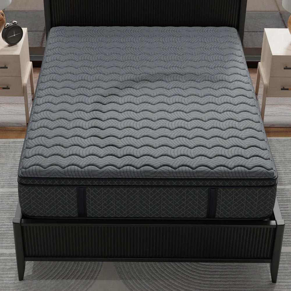 High-angle top view of the 12-inch Allureluxe Bamboo Hybrid Elite mattress highlighting the wave-patterned quilted cooling cover.
