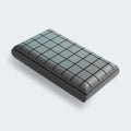 Contoured graphite memory foam pillow for neck support and temperature regulation during sleep.
